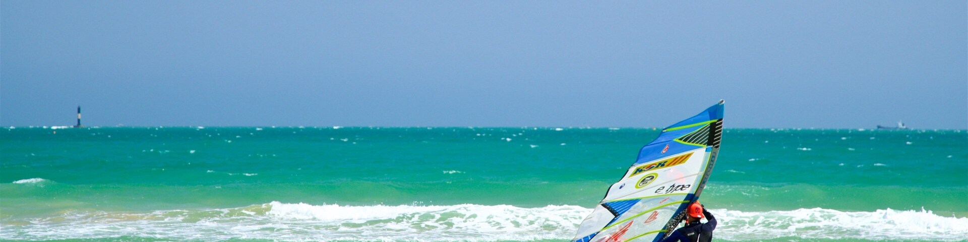 Songjeong Beach featuring general coastal views, waves and kite surfing