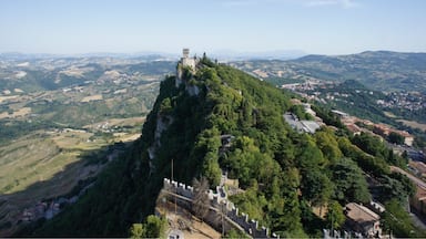 San Marino is beautiful, and should be on everyone's bucket list. It can be seen in a day but it's worth staying overnight as it's much quieter in the evenings, the towers stay open until 8pm in summer, and the sunsets are magical