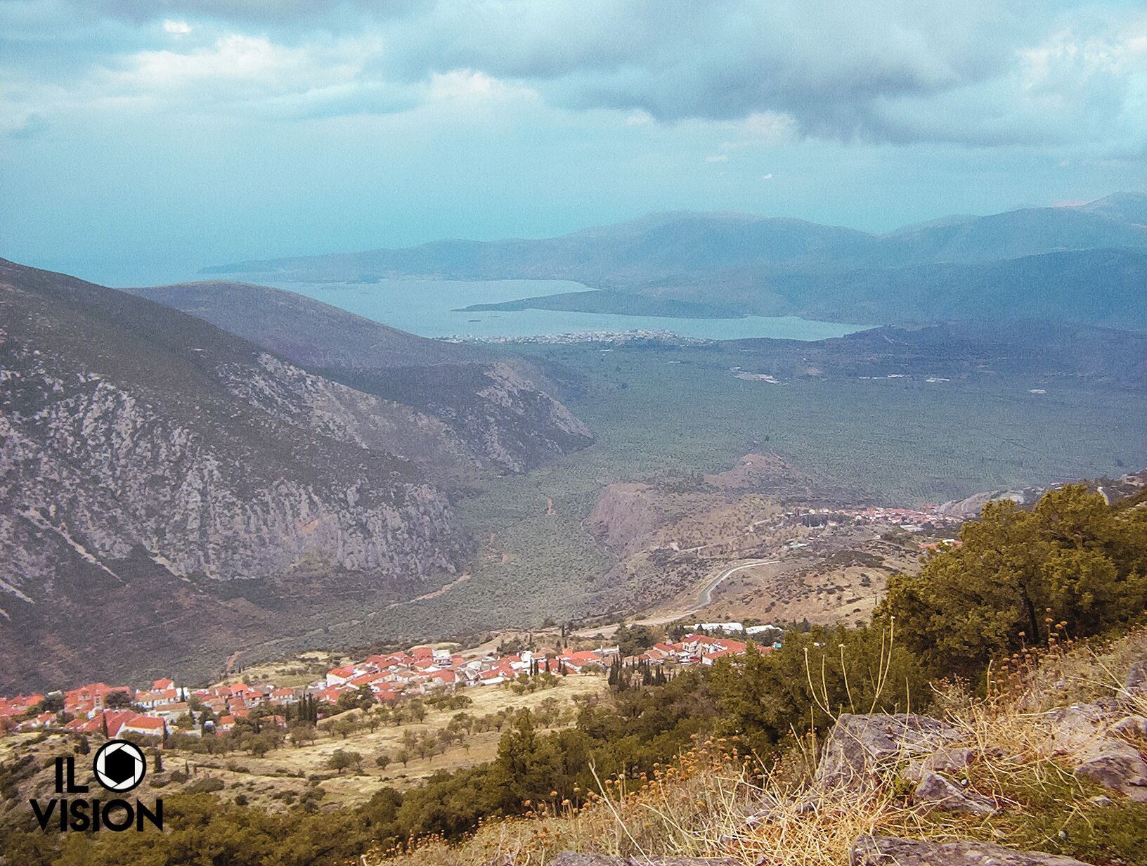 Mount Parnassus is a mountain of limestone in central Greece that towers above Delphi, north of the Gulf of Corinth, and offers scenic views of the surrounding olive groves and countryside.