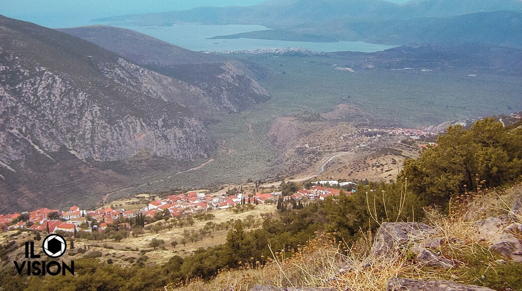 Mount Parnassus is a mountain of limestone in central Greece that towers above Delphi, north of the Gulf of Corinth, and offers scenic views of the surrounding olive groves and countryside.