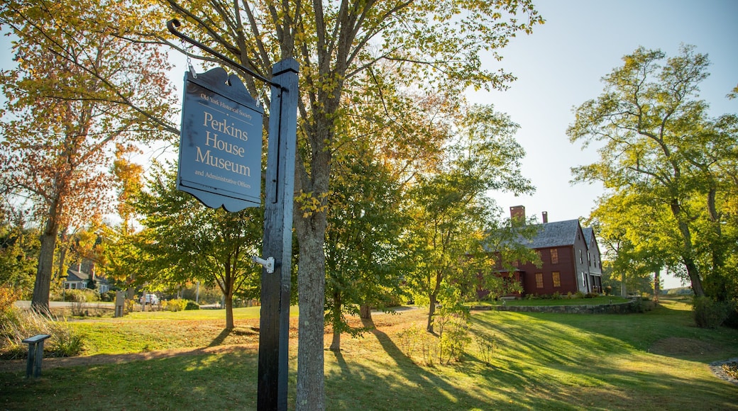 Elizabeth Perkins House featuring signage and a house