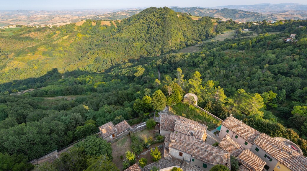 Montefiore Conca which includes a small town or village, tranquil scenes and landscape views