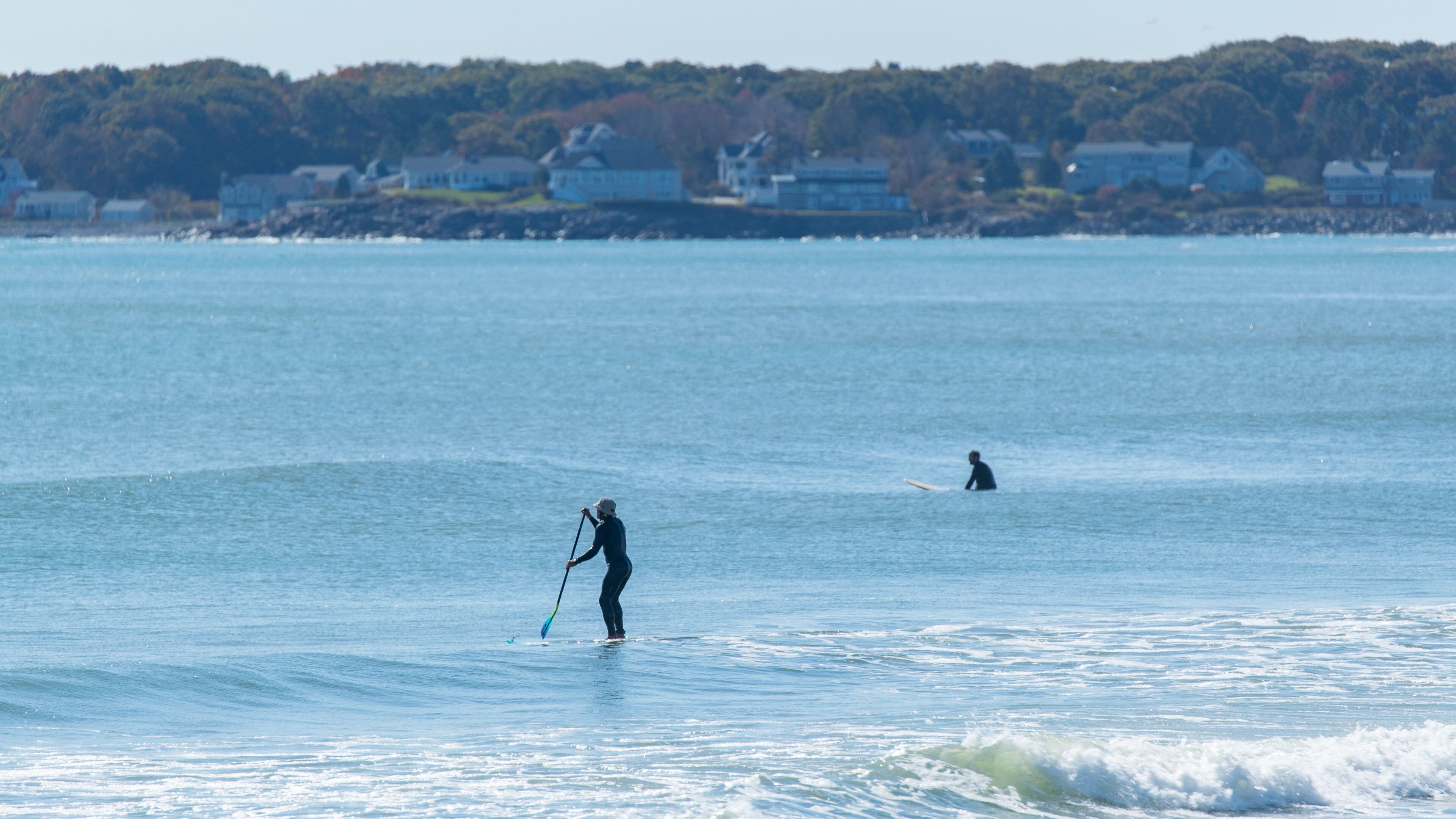 Long Sands Beach which includes kayaking or canoeing and general coastal views as well as an individual male
