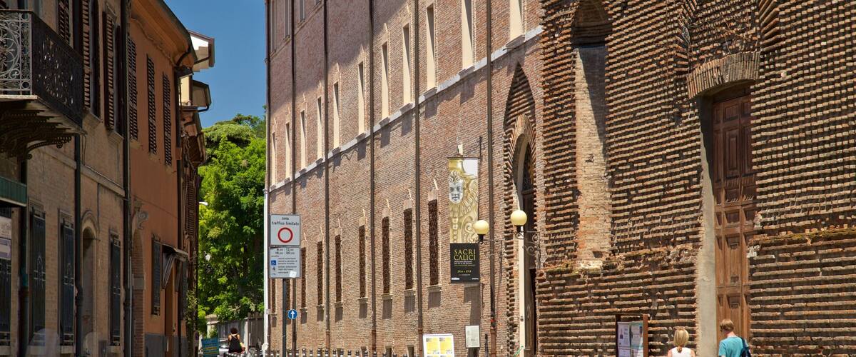 Museo della Città showing street scenes as well as a couple