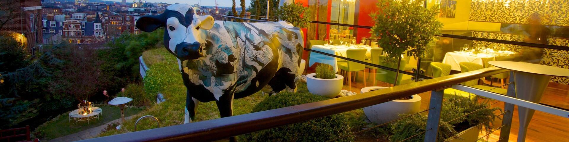 Jardins Kensington Roof Gardens mettant en vedette statue ou sculpture