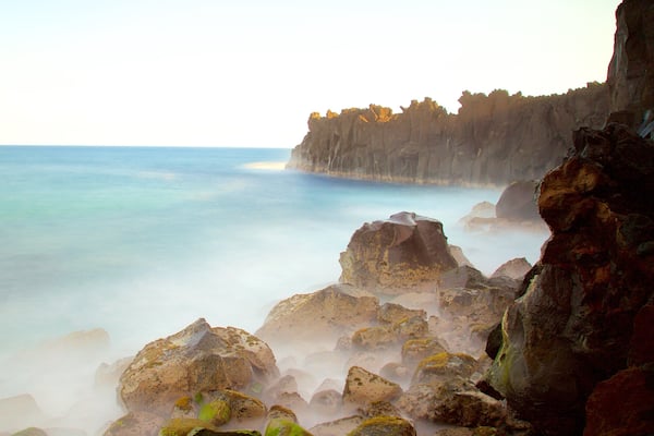 Cape Mechant showing mist or fog and rocky coastline
