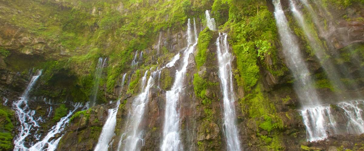Grand Galet Falls featuring a cascade and a lake or waterhole