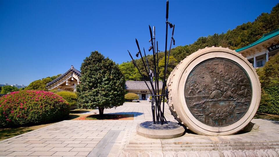 Chungnyeolsa featuring wild flowers, a park and heritage elements