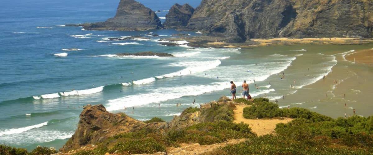 Where the river Ceixe meets the Atlantic, lies Odeceixe, technically already in the Algarve region. But this is not the typical Algarve you are used to. Odeceixe is well known for one of the largest and glorious beaches in Portugal, surrounded by giant tree-covered cliffs of a giant natural park.
Iâve been there several times, but never stayed more than one full day. I REALLY want to come back not only for the top-notch local beach, but also to hike some of the cliffs in the surroundings. This is probably the best beach youâll find in southwest Portugal.
Fancy a roadtrip? Try SW Portugal!
http://www.geekyexplorer.com/southwest-portugal-the-best-road-trip-to-take-this-summer/
#LikeALocal
#Beach #Waves