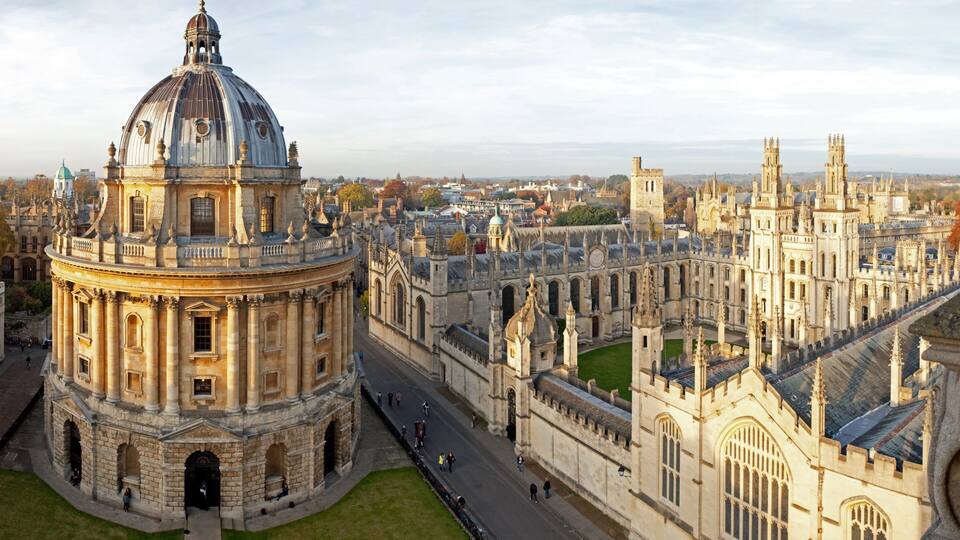 A historic university campus with a prominent dome and Gothic architecture.