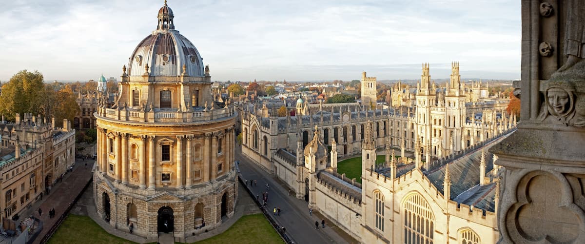A historic university campus with a prominent dome and Gothic architecture.