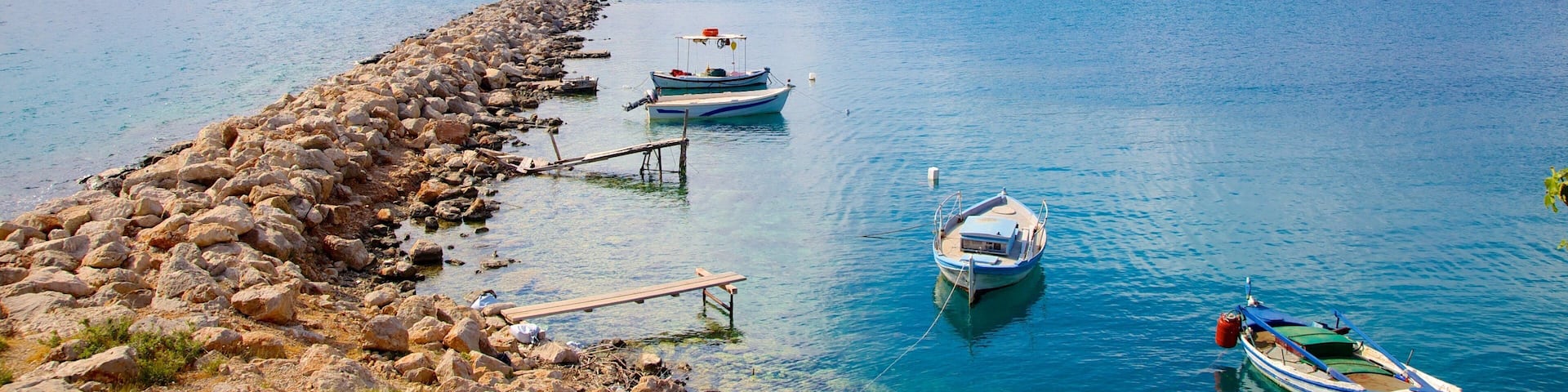Nafplio showing a bay or harbor and rocky coastline