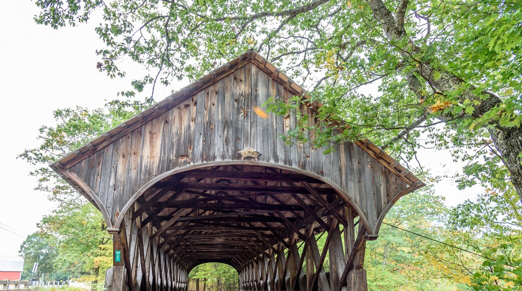 Sunday Covered Bridge in Newry Maine it Spans the Sunday River. It is one of the Most Painted and Photographed Covered Bridges in Maine