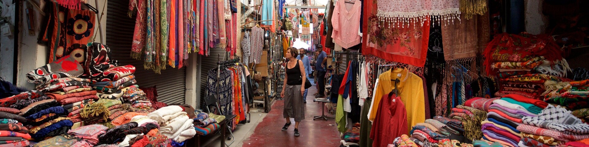 Jaffa Flea Market featuring markets and interior views as well as an individual femail