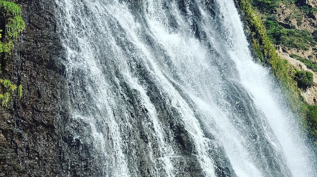 The last of three waterfalls on a secret path that flow into the ocean.