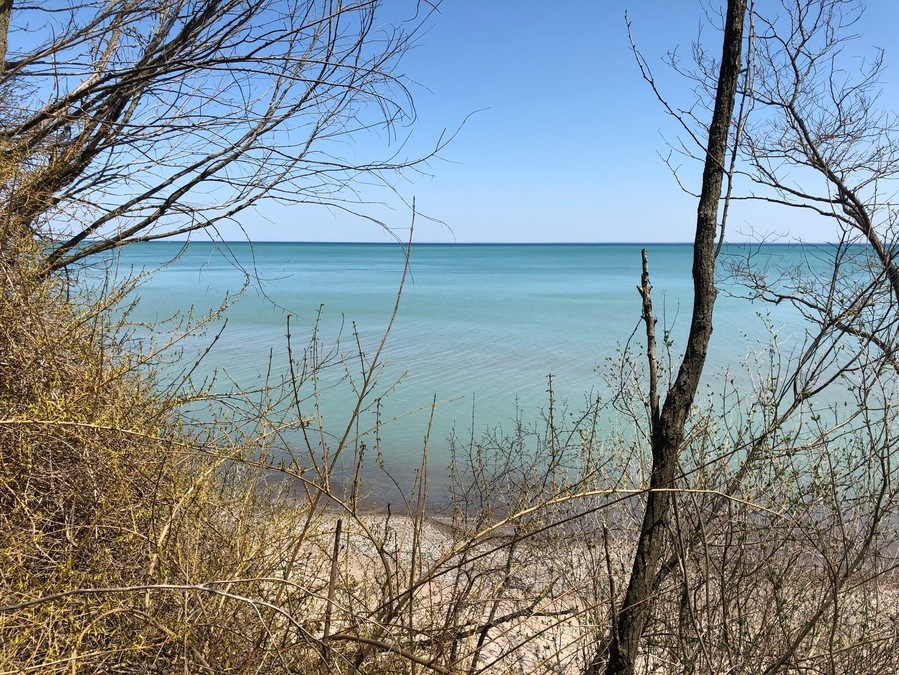 Nothin’ but blue skies! Serene and calm waters on Lake Michigan.