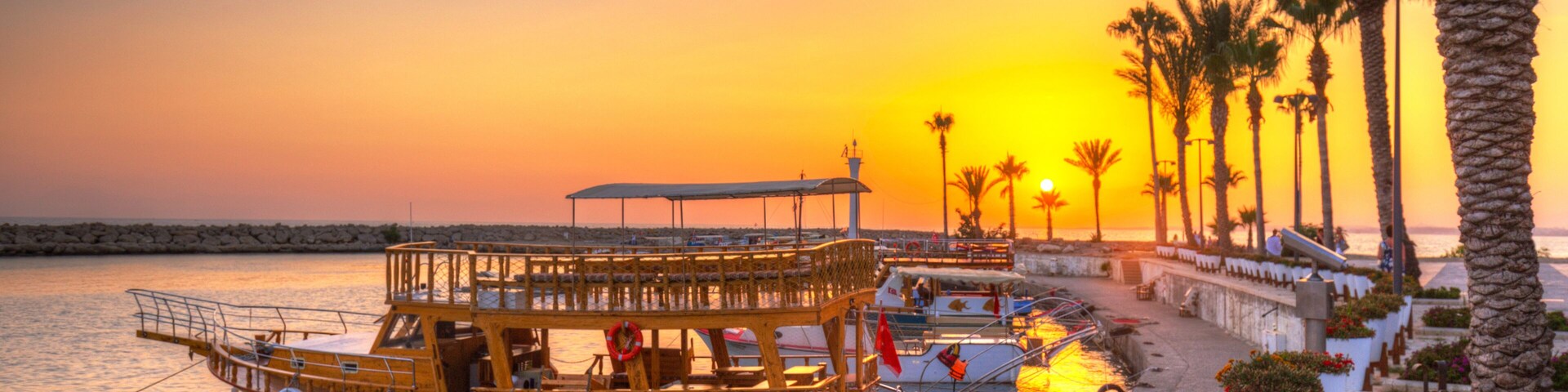 The harbour with boats in Side at sunset, Turkey