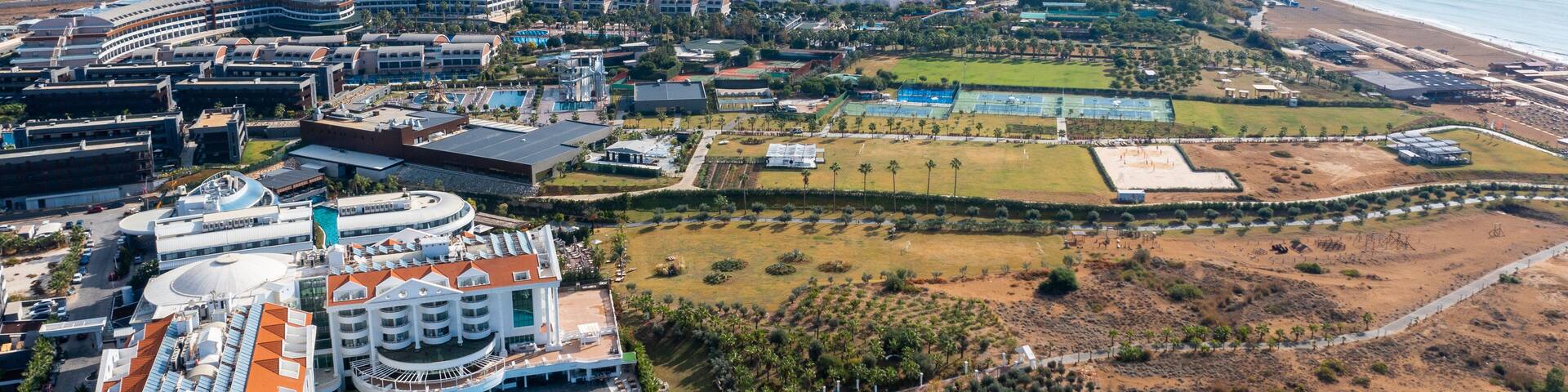 Gündoğdu holiday tourist region. Summer vacation on beach, Hotels sea, beach, coast, sports fields, water sports and sun. Drone Aerial view. Mediterranean, Manavgat - Alanya – TURKEY