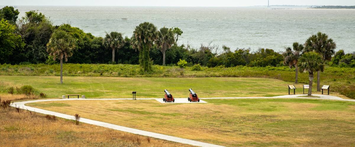 Fort Moultrie showing a park, military items and general coastal views