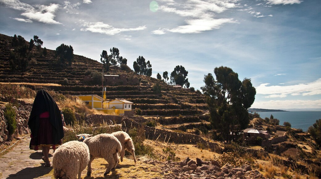 Isla Taquile is a tiny island in the Peruvian side of the huge Lake Titicaca, situated at an altitude of over 12,000 ft.