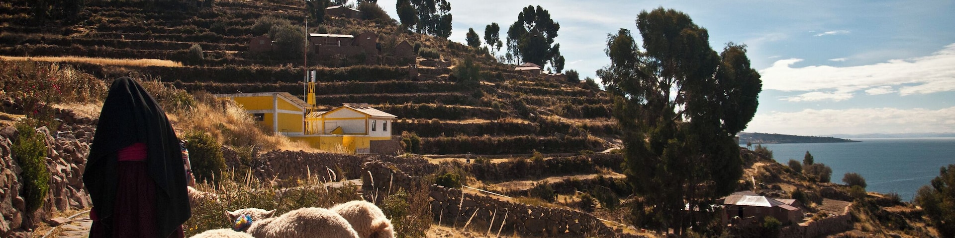 Isla Taquile is a tiny island in the Peruvian side of the huge Lake Titicaca, situated at an altitude of over 12,000 ft.