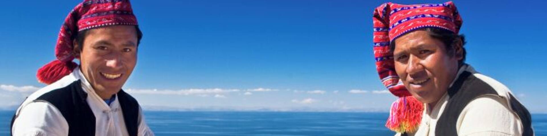 Portrait of two young men sitting, Taquile Island, Lake Titicaca, Puno, Peru