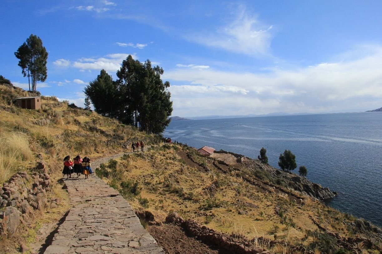 On the Peruvian side of Lake Titicaca, Taquile is a beautifully green island with a very Mediterranean feel.  It's possible to make day tips here from Puno, 45km away (we went with Edgar Adventures for a cost of 60 soles each).  The island is most famous for its handicrafts (knitting and weaving), which are considered among the best in the whole of Peru.  Most trips here will include a short hike to the island's highest point (4050 metres above sea level), a little bit of history about the island's culture and handicrafts, and a gorgeous lunch of fresh fish and Muña tea.  Definitely a worthwhile trip and not as touristy as the guidebooks would have you believe.