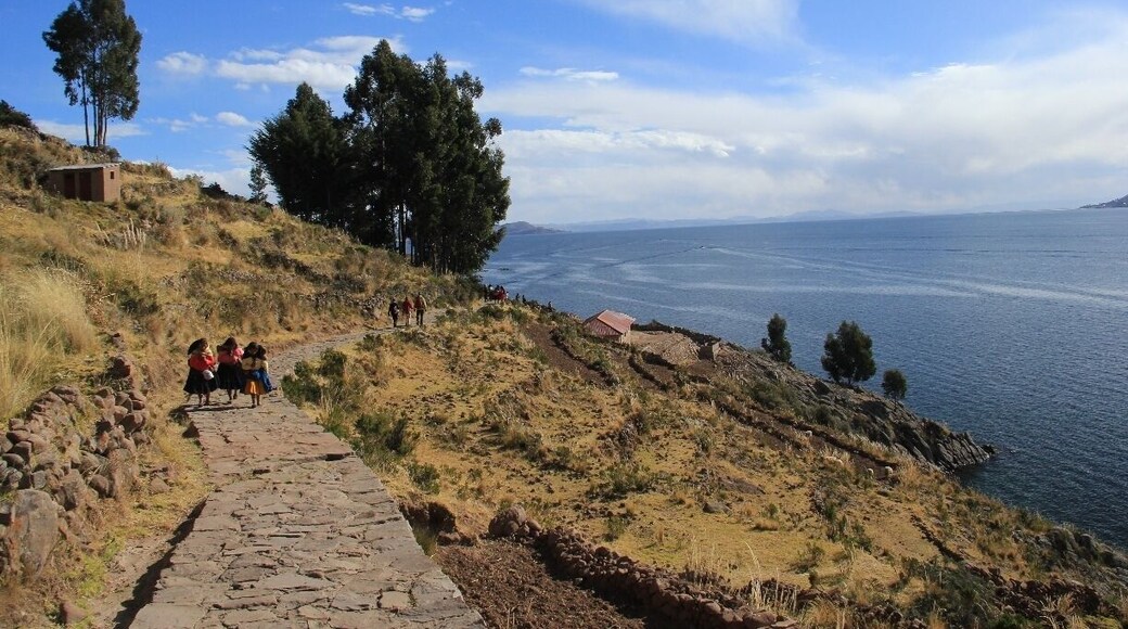 On the Peruvian side of Lake Titicaca, Taquile is a beautifully green island with a very Mediterranean feel. It's possible to make day tips here from Puno, 45km away (we went with Edgar Adventures for a cost of 60 soles each). The island is most famous for its handicrafts (knitting and weaving), which are considered among the best in the whole of Peru. Most trips here will include a short hike to the island's highest point (4050 metres above sea level), a little bit of history about the island's culture and handicrafts, and a gorgeous lunch of fresh fish and Muña tea. Definitely a worthwhile trip and not as touristy as the guidebooks would have you believe.