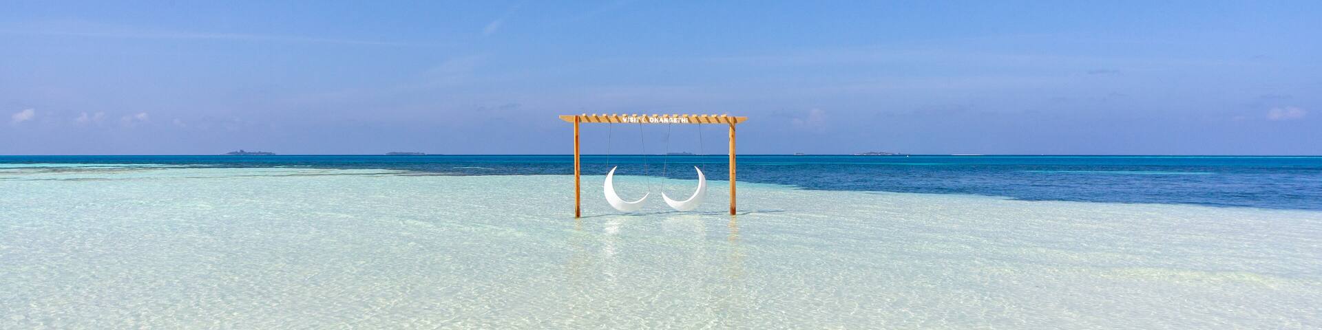 The beautifull beach of Dhangethi, maldives. Known for Diving, day tour for resort and this beautifull beaches and the swing in the water