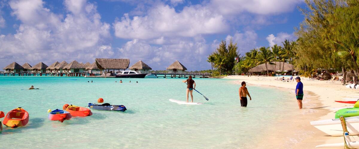 Motu Tape showing tropical scenes, a beach and kayaking or canoeing