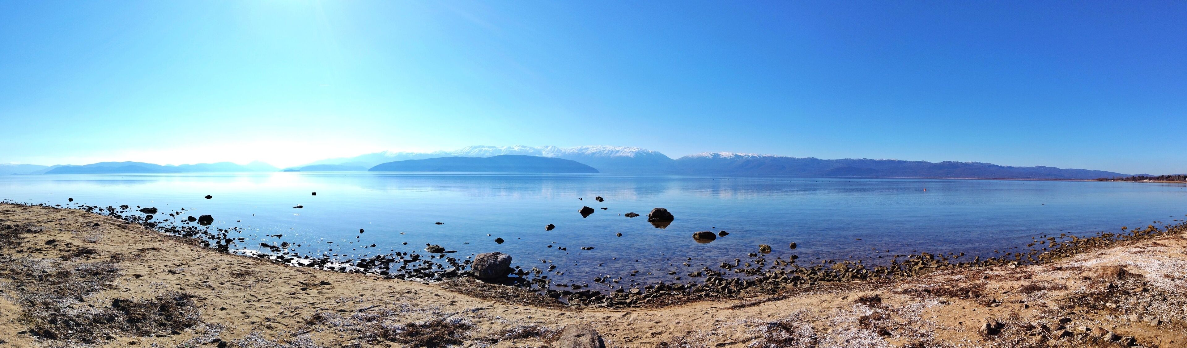 panoramic image of a lake prespa in macedonia