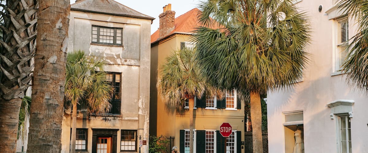 Pink House Gallery featuring street scenes as well as a family