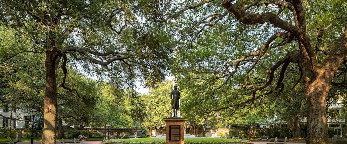 Washington Square featuring a statue or sculpture and a park