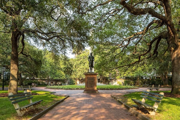 Washington Square featuring a statue or sculpture and a park