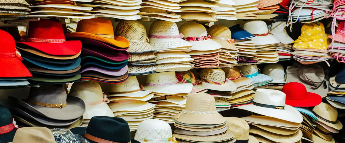 Traditional Arequipenan hats for sale at a stall in the San Camileo central market in Arequipa, Peru. South America.