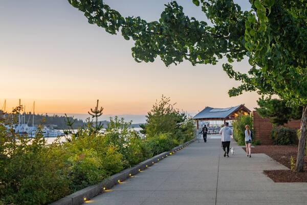 Percival Landing which includes a sunset as well as a couple