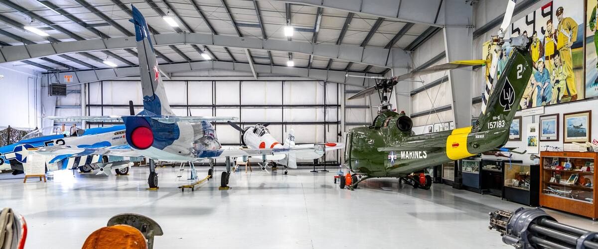 Olympic Flight Museum which includes military items, interior views and aircraft