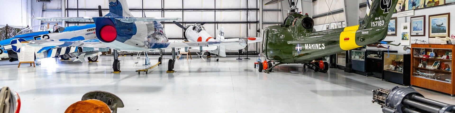 Olympic Flight Museum which includes military items, interior views and aircraft