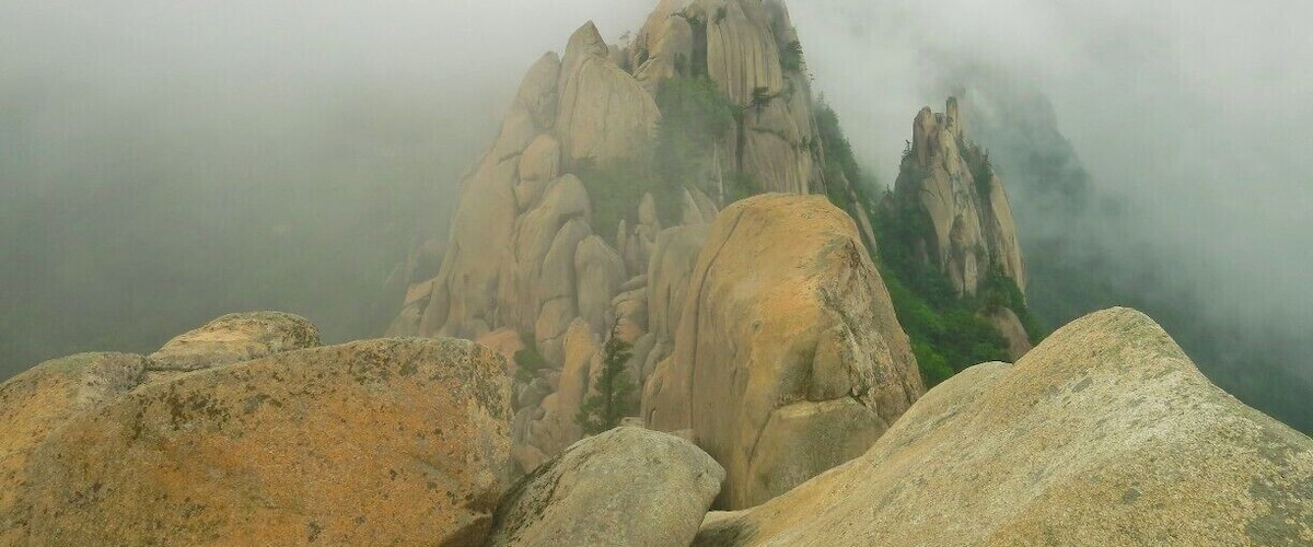 The magnificent Ulsan Bawi peak in Seoraksan National Park, Korea. This famous ridge is one of Korea's best hikes! Even in the rain and mist...