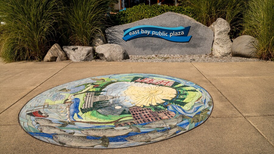 East Bay Public Plaza featuring outdoor art and signage