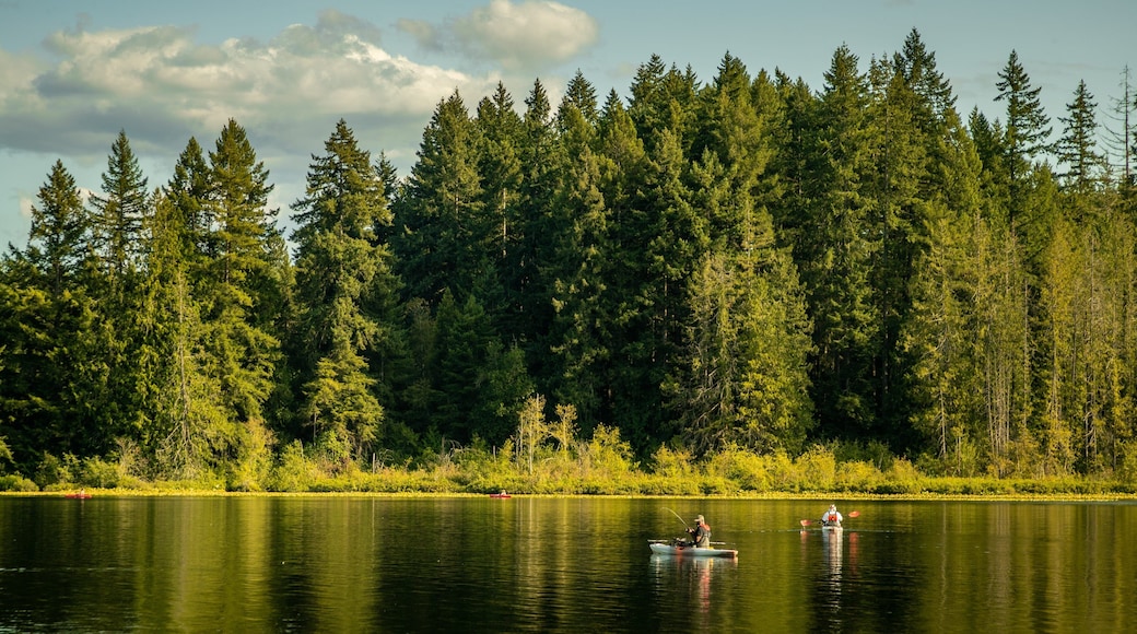 Millersylvania State Park featuring a lake or waterhole and kayaking or canoeing as well as a couple