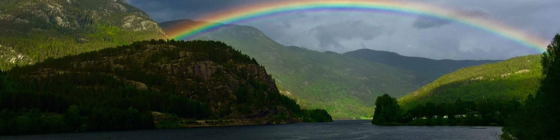 Hereâs my absolute favourite photo of a rainbow đ
To be honest, the photo was taken so randomly. I was actually in a car, on the way to see fjords. It was snowing and raining; the next moment the sky cleared up and this beauty appeared. Iâve never seen a rainbow that big, that full and that bright. The moment I saw it, I asked to pull over and let me have a look and take a picture (yep, thatâs what I am like, taking pics of everything I think is beautiful đŹ).
I actually think that this trip to #Norway is probably the best one Iâve experienced so far; the views were breathtaking. Each and every single moment of the time spent there was so special and memorable. I loved the clean air and roads there, I loved the nature, the grass that despite all the cold looked incredibly bright, fresh and juicy (animalsâ heaven, really), the sky, the #fjords, the waterfalls.
I advise visiting the country for more than 100% because youâll never regret going there and will remember it forever. Just wrap up warm, get comfy boots (several pairs, if possible, because youâll get wet to the skin), some friends or family members who can drive (if you cannot yourself) and youâre good to go!
Whatâ was your favourite trip yet?