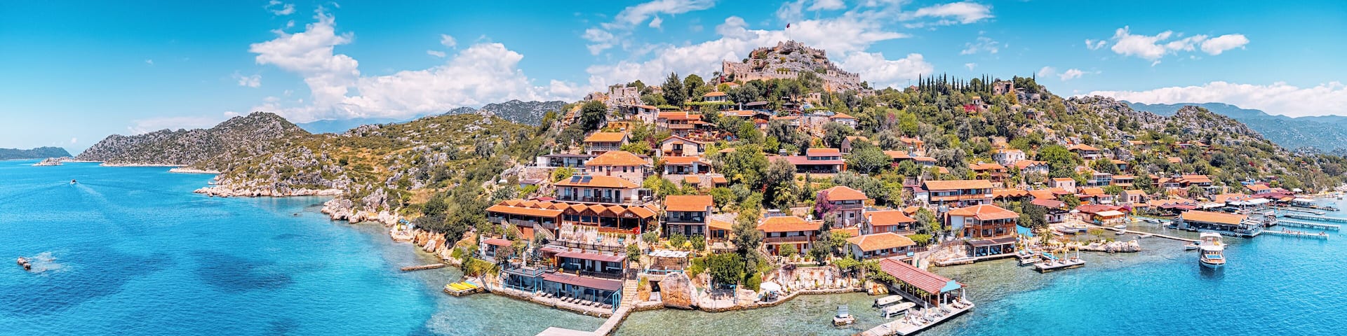 Aerial view of Simena castle and fishing and tourist village Kaleucagiz. Tourist and travel destinations in Turkey