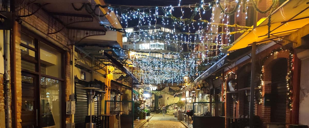 Night photo of Ladadika a historic district and iconic landmark in Thessaloniki, known for its vibrant atmosphere, traditional charm, and lively nightlife.