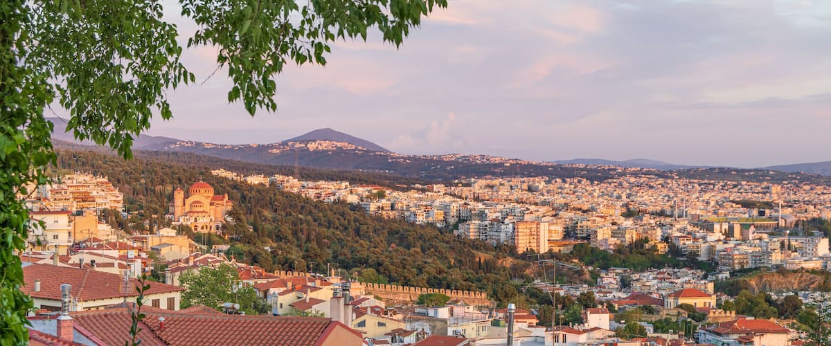 Panoramic View during sunset from old city wall with Saint Paul church Ano Poli Thessaloniki in Central Macedonia in Greece