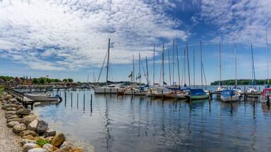view of the harbor front promenade and marina and yacht harbor in Nysted