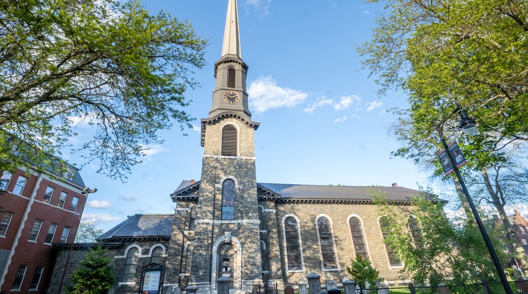 Kingston, NY - USA- May 12, 2021: The Old Dutch Church, a 19th-century bluestone church and cemetery located on Wall Street in the Kingston Stockade District.