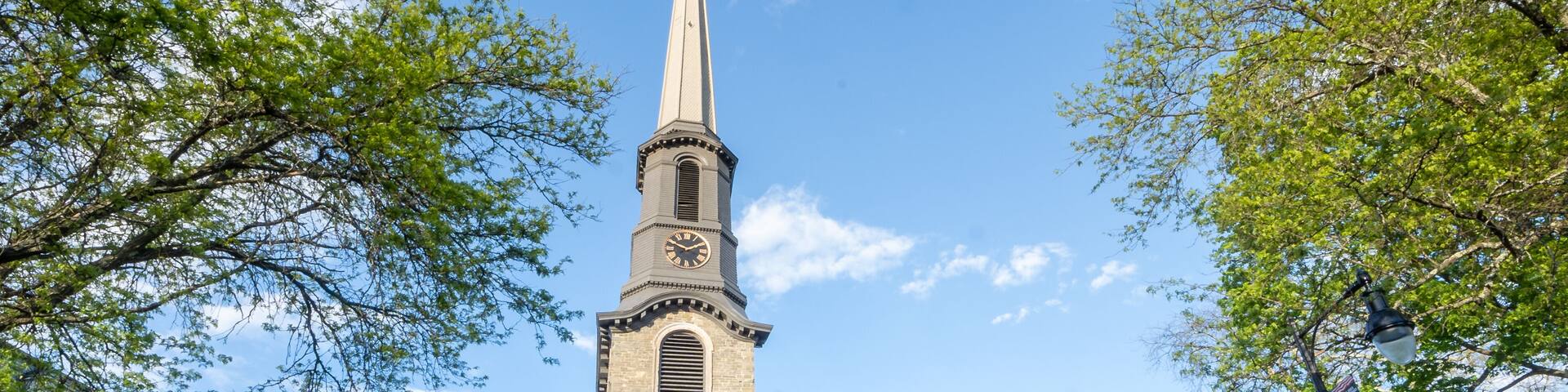 Kingston, NY - USA- May 12, 2021: The Old Dutch Church, a 19th-century bluestone church and cemetery located on Wall Street in the Kingston Stockade District.
