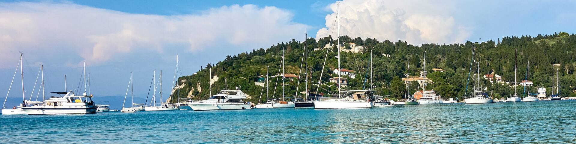 The beautiful Greek island of Paxos, view of Lakka harbour from the shoreline
