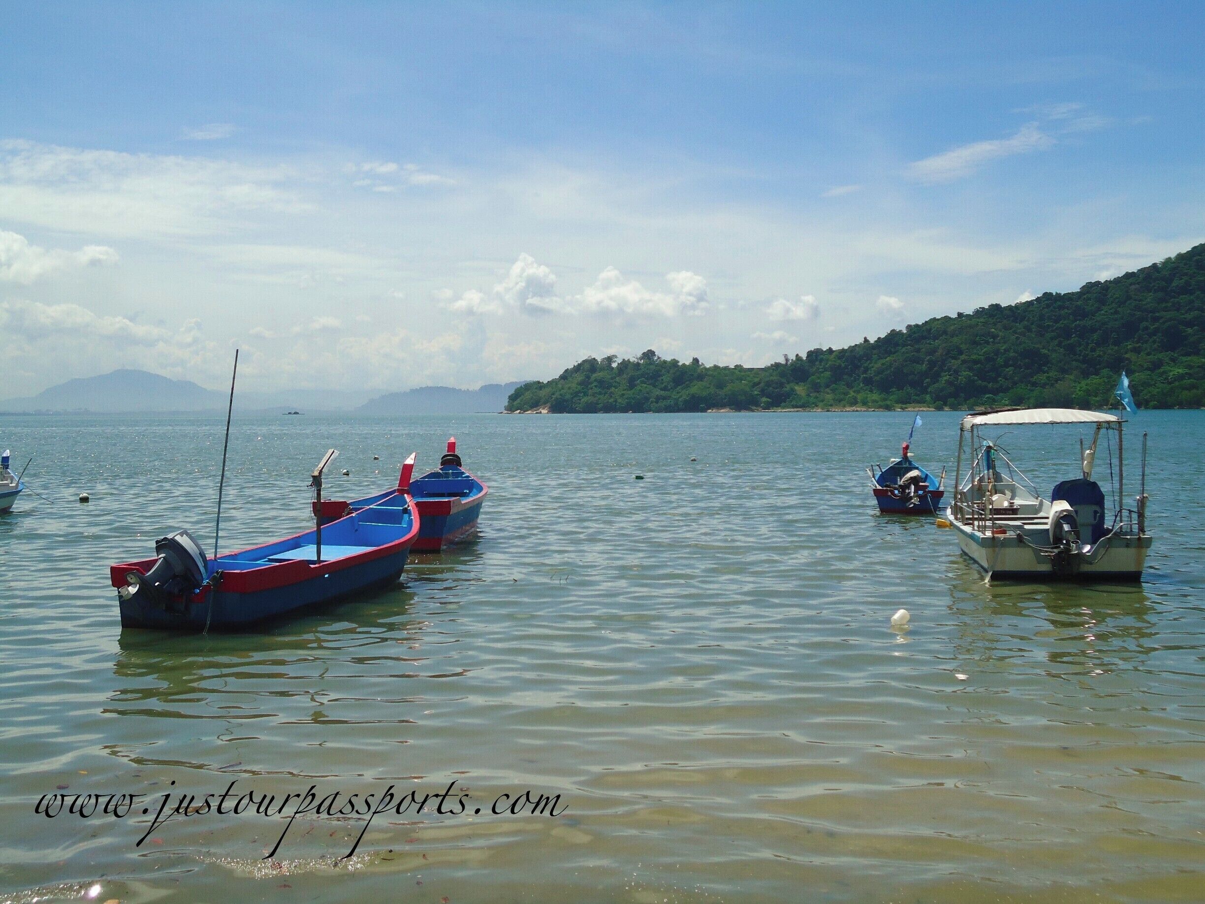 Penang is a large island with a lot of character. There is more to the island than the reknown Georgetown, even though it is amazing in itself. This photo was taken near the Queensbay Mall on the southern end of Penang. Mainland Malaysia is seen in the distance. Local fishermen leave their boats close to shore, creating a beautiful spot to enjoy the water. #waterlust